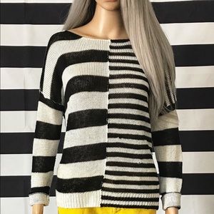 Black and White striped sweater.